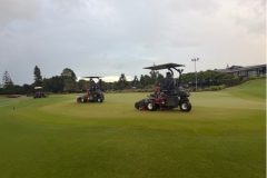 Verti‑cutting-the-greens-on-The-Palms-golf-course