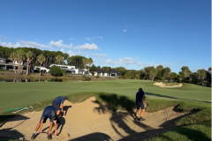 Checking-bunker-sand-depth-and-levelling-where-required-on-The-Palms-golf-course