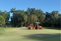 Light-top-dressing-being-applied-to-the-2nd-green-of-The-Palms-golf-course