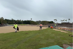 Contractors-assisting-with-laying-new-turf-on-The-Palms-golf-course-3rd-tee
