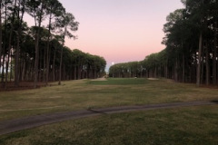 Early-morning-view-of-the-3rd-hole-on-The-Pines-golf-course-with-the-full-moon-setting-in-the-distance