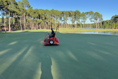 Rolling-the-10th-green-on-The-Pines-golf-course-for-the-Legends-Pro-Am-