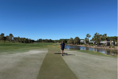 Brooming-The-Palms-golf-course-greens-after-dusting-with-the-1st-hole-shown