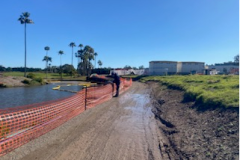 Repairing-the-temporary-fence-on-the-10th-hole-of-The-Palms-golf-course