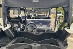 Magnetic rear bag covers that fold neatly beneath the top assembly. 