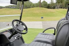 Refined top assembly with internally mounted grab handles and integrated water drainage through the front struts. 