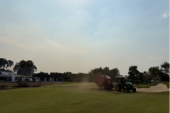 Rake-O-Vac-cleaning-up-scarifying-debris-from-green-surrounds