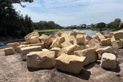 Rocks-delivered-for-the-wall-at-the-16th-and-17th-tees-on-The-Palms-golf-course