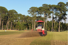 Ventrac-brooming-greens-after-scarifying